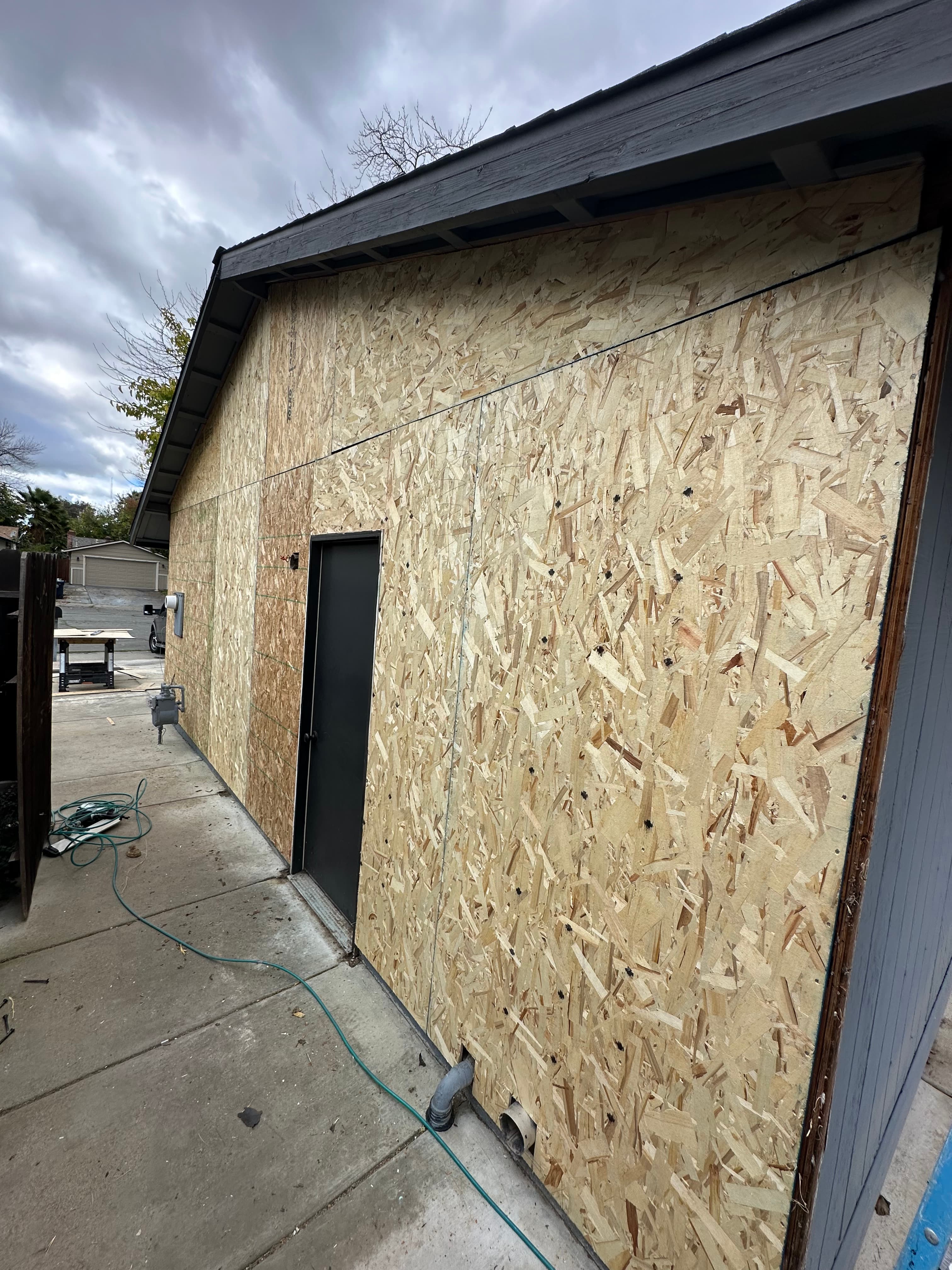 Dry rot damage exposed before siding repair in Sacramento, CA by NorCal Exteriors