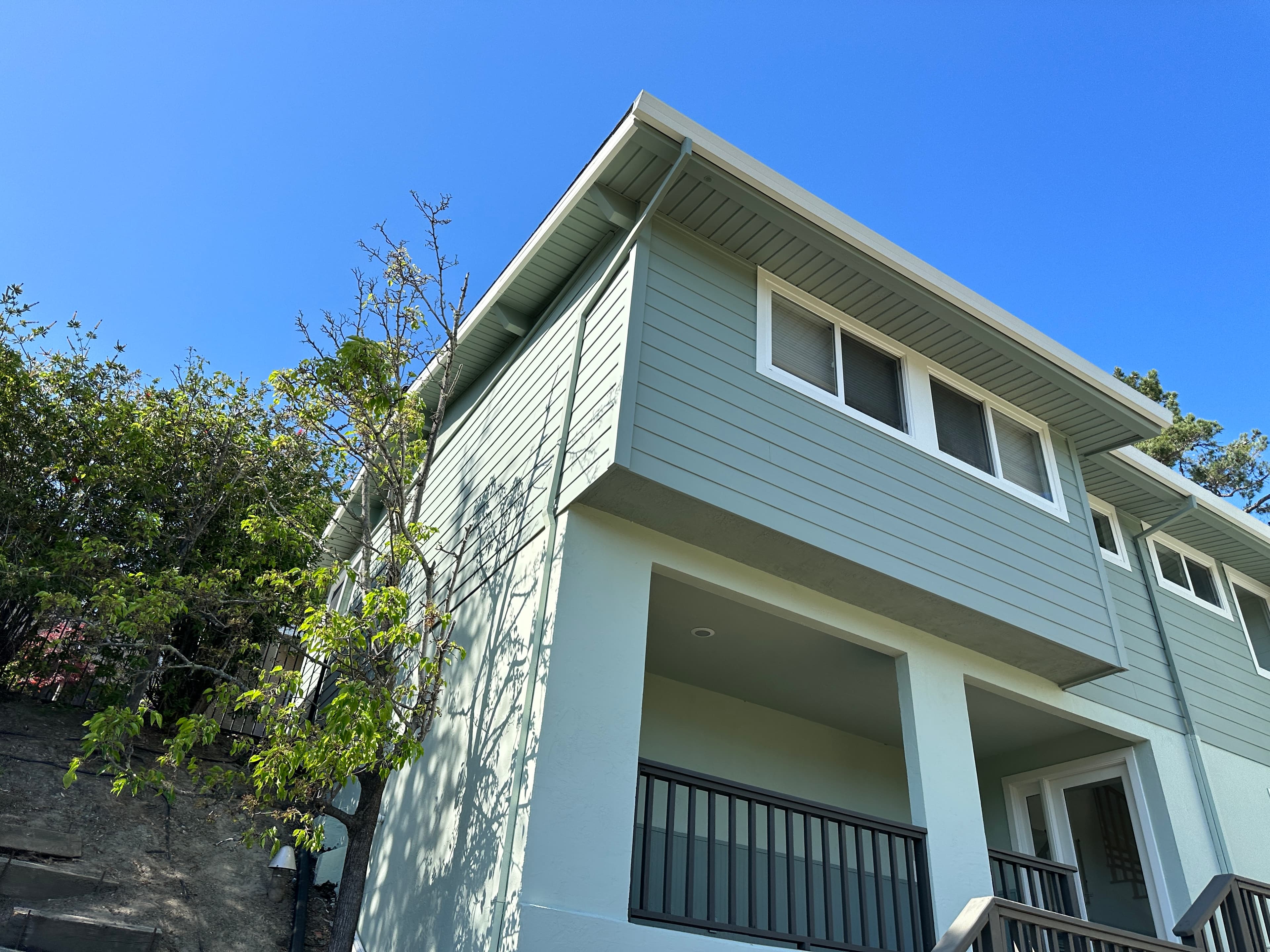 Hardie board siding replacement on two-story home in Sacramento, CA by NorCal Exteriors