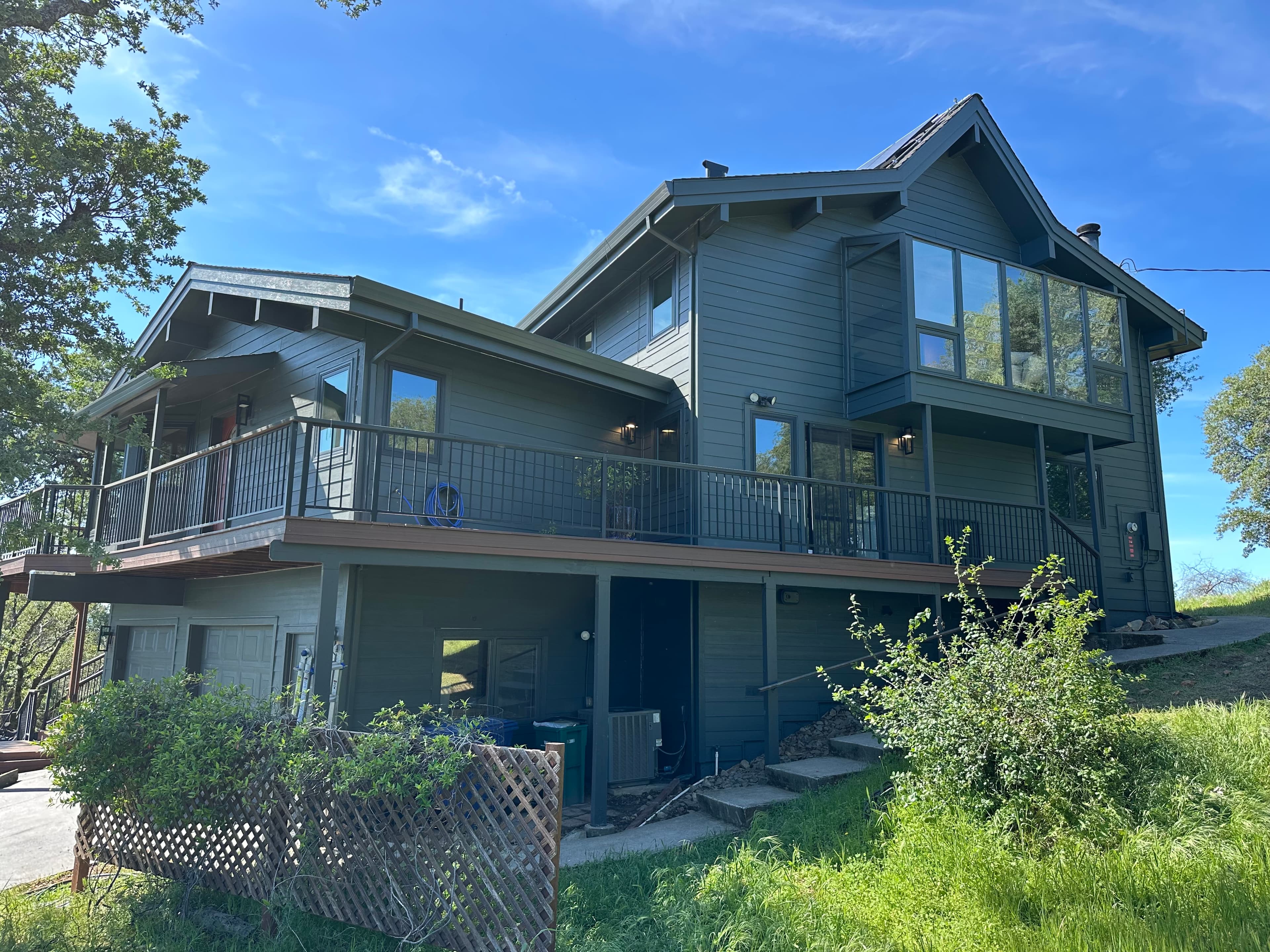 Multi-story exterior siding remodel in Sacramento foothills by NorCal Exteriors