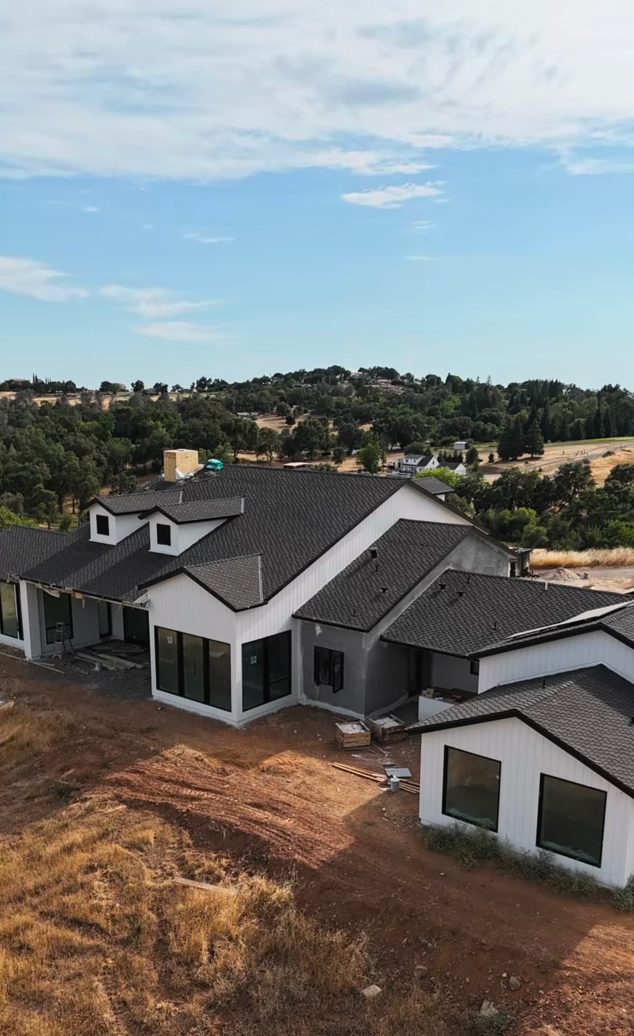 New construction custom home exterior siding in Sacramento foothills by NorCal Exteriors Inc
